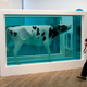 Damien Hirst’s “Mother and Child Divided” at the Tate Modern in London. AP Photo/Matt Dunham